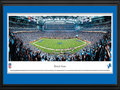 Picture: This 13.5 X 40 panorama of the Detroit Lions NFL football team playing at Ford Field has been professionally double matted in team colors and framed to 18 X 44. The team started in 1929 as the Portsmouth Spartans, joined the NFL in 1930 and became the Detroit Lions in 1934. The Lions played at the University of Detroit Stadium for four years and then moved to Briggs Stadium (later named Tiger Stadium) in 1938. In 1975, the Lions moved to the Pontiac Silverdome, where they played until moving to Ford Field in 2002. The Lions' history includes NFL Championships, several enshrinees in the Pro Football Hall of Fame and one of America's best holiday traditions – Detroit's annual Thanksgiving Day Classic. From the NFL Stadiums collection.