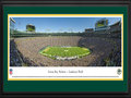 Picture: This 13.5 X 40 panorama has been professionally double matted in team colors and framed to 18 X 44. It spotlights the exciting action of the Green Bay Packers winning on their home turf at Lambeau Field. Highlighting the completion of the third year of a five year renovation project, this expansion included a new sound system, a high definition Tundra Vision and a new entry gate. The completion of the South End Zone added approximately 7,600 seats for Packer fans, which brings seating capacity to the third-largest stadium in the National Football League. Lambeau Field is arguably the NFL’s most revered stadium. The renovations build on the history and tradition of Lambeau Field, and showcase the Green Bay Packers, whom have won more championships than any other team in NFL history. From the NFL Stadiums collection.