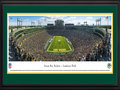 Picture: This 13.5 X 40 panorama of the Green Bay Packers NFL football team at play has been professionally double matted in team colors and framed to 18 X 44. It spotlights the action at one of the most recognized and envied locales in all of sports, Lambeau Field. Dedicated as City Stadium in 1957 and renamed Lambeau Field in 1965, it is the longest continuously occupied stadium in the NFL. The Green Bay Packers were founded in 1919 and played their first two years as an independent team before joining the NFL in 1921. The “Packers,” the oldest team name still in use in the NFL, comes from the company that first supplied the team with uniform money, the Indian Packing Company. The Green Bay Packers have won more championships than any other team in the National Football League. From the NFL Stadiums collection.