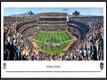 Picture: This panoramic has been professionally framed to 13.75 X 40.25. It underscores the on-field action of the Oakland Raiders playing to their home crowd at Oakland-Alameda County Coliseum. The Raiders began play in 1960, as a charter member of the American Football League (AFL), and joined the National Football League (NFL) in 1970. In the ensuing five decades, the Raiders have won an AFL Championship; won four AFC Championships; participated in five Super Bowls, winning three Super Bowls; and won or tied for seventeen division titles. The Raiders are the only club in the NFL to play in at least one Super Bowl in the 1960s, 1970s, 1980s, and 2000s. From the NFL Stadiums collection.