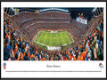 Picture: This panoramic of the Denver Broncos playing at Mile High Stadium has been professionally framed to 13.75 X 40.25. The Denver Broncos began as one of eight American Football League (AFL) charter franchises in 1960 and entered the NFL with the merger of the two leagues in 1970. With one of the best records in pro football over the past 50 seasons, the Denver Broncos have been one of the most consistent winners in professional sports. The Broncos won their first AFL game ever played, and they captured their first Super Bowl win in the 1997 season – the first of back-to-back Super Bowl Championships. The Broncos’ success on the field is more than matched by a spectacular fan base. Denver has sold out every home game since the beginning of the 1970 season, marking the second-longest active streak in the NFL. From the NFL Stadiums collection.