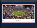 Picture: This 13.5 X 40 panoramic of the Denver Broncos playing at Mile High Stadium has been professionally double matted in team colors and framed to 18 X 44. The Denver Broncos began as one of eight American Football League (AFL) charter franchises in 1960 and entered the NFL with the merger of the two leagues in 1970. With one of the best records in pro football over the past 50 seasons, the Denver Broncos have been one of the most consistent winners in professional sports. The Broncos won their first AFL game ever played, and they captured their first Super Bowl win in the 1997 season – the first of back-to-back Super Bowl Championships. The Broncos’ success on the field is more than matched by a spectacular fan base. Denver has sold out every home game since the beginning of the 1970 season, marking the second-longest active streak in the NFL. From the NFL Stadiums collection.