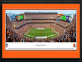 Picture: This 13.5 X 40 panorama has been professionally double matted in team colors and framed to 18 X 44. It spotlights the Cleveland Browns hosting the Baltimore Ravens at FirstEnergy Stadium in an AFC North matchup. The Browns joined the NFL in 1950 winning a championship in their inaugural year and advancing to the NFL championship six straight seasons after. Tradition is important to the Browns as they continue to play on the same site, on the shores of Lake Erie, since they were established in 1946. This is the site of Cleveland Municipal Stadium, where the Browns won all their league championships and hosted all their postseason games. From the NFL Stadiums collection.