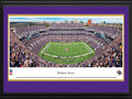 Picture: This 13.5 X 40 panorama of the Baltimore Ravens playing for their home crowd at M&T Bank Stadium has been professionally double matted in team colors and framed to 18 X 44. Known for staging one of the NFL's most exciting gameday experiences, M&T Bank Stadium was completed in 1998 and has a seating capacity of 71,008. The Baltimore Ravens came into existence in 1996, and their name is a reference to the poem "The Raven" by Edgar Allan Poe, who lived and worked in Baltimore at various times during his life. The Ravens' championship history includes a victory in Super Bowl XXXV, in addition to multiple division titles and playoff berths. From the NFL Stadiums collection.