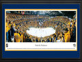 Picture: This 13.5 X 40 panorama has been professionally double matted in team colors and framed to 18 X 44. It captures the Nashville Predators celebrating their Western Conference Quarterfinal victory over the Detroit Red Wings in Game 5. The Predators won the series 4-1, capping a season in which they finished ahead of their National Hockey League Central Division rival for the first time. They also beat the Red Wings for the first time in their third playoff series. The Predators made it even sweeter by handing the Red Wings their earliest postseason departure since a six-game first-round loss to Edmonton in 2006. In Nashville tradition, the fans tossed catfish on the ice in celebration at Bridgestone Arena.