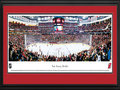 Picture: This 13.5 X 40 panorama has been professionally double matted in team colors and framed to 18 X 44. It is of the New Jersey Devils of the National Hockey League and the Prudential Center, their home since 2007-08. The only sports team proud to wear New Jersey on its chest was established in 1982 and named after the legendary Jersey Devil, which roamed the Pinelands of south Jersey. The Devils made their mark in the Garden State, capturing the Stanley Cup on multiple occasions. Built in downtown Newark, New Jersey, the 17,625-seat arena was the first built in the metropolitan area in more than 25 years and is the driving force behind the city's revitalization.