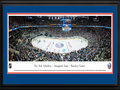 Picture: This 13.5 X 40 panorama has been professionally double matted in New York Islanders team colors and framed to 18 X 44. It showcases a night of firsts for the New York Islanders as they kicked off their season in their new home, Barclays Center in Brooklyn. The move keeps the team in the metropolitan area after the team had played the first 43 years of their existence at Nassau Veterans Memorial Coliseum. Since their inception into the National Hockey League in 1972, the Islanders have enjoyed an epic history. The Islanders nineteen consecutive playoff wins, which included four Stanley Cup Championships within the span, is a feat that remains unparalleled in the history of all professional sports.