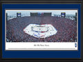 Picture: This 13.5 X 40 panorama of the 2014 Bridgestone NHL Winter Classic has been professionally double matted and framed to 18 X 44. It features its first Canadian team, as the Toronto Maple Leafs and the Detroit Red Wings took to the ice. The annual event, held by the National Hockey League on or around New Year’s Day, celebrates the history and tradition of outdoor hockey. This year’s event was played at The Big House on the University of Michigan campus and the NHL announced an attendance record of 105,491 during the third period. In the end, the Maple Leafs edged out the Red Wings in a shootout, resulting in a final score of Toronto 3, Detroit 2. The first NHL Winter Classic was held in 2008.