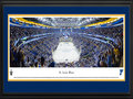 Picture: This 13.5 X 40 panorama captures the St. Louis Blues scoring a goal on home ice at the Scottrade Center and has been professionally double matted in team colors and framed to 18 X 44. In this National Hockey League Western Conference Quarterfinals series game, the Blues were pitted against the defending Stanley Cup Champions, the Los Angeles Kings. The Blues won the first matchup of this series, with all five games decided by one goal and one of those games going into overtime. This is the third all-time playoff encounter between the Kings and the Blues. The success of the St. Louis Blues speaks for itself, as they reached the Stanley Cup Final in each of their first three seasons and reached the playoffs in 25 consecutive seasons.