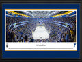 Picture: This 13.5 X 40 panorama captures the St. Louis Blues scoring a goal on home ice at the Scottrade Center and has been professionally double matted in team colors and framed to 18 X 44. In this National Hockey League Western Conference Quarterfinals series game, the Blues were pitted against the defending Stanley Cup Champions, the Los Angeles Kings. The Blues won the first matchup of this series, with all five games decided by one goal and one of those games going into overtime. This is the third all-time playoff encounter between the Kings and the Blues. The success of the St. Louis Blues speaks for itself, as they reached the Stanley Cup Final in each of their first three seasons and reached the playoffs in 25 consecutive seasons.