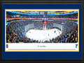 Picture: This 13.5 X 40 panorama of the St. Louis Blues playing to their fans in St. Louis, Missouri at the Scottrade Center has been professionally double matted in team colors and framed to 18 X 44. The Blues were one of the six teams added to the National Hockey League in the 1967 expansion and the last of the expansion teams to officially gain entry into the league. Taking inspiration from a famous song, the team was named the Blues and played their first game on October 11th. The Blues got off to a successful start, reaching the Stanley Cup® Final in each of its first three seasons. In addition, the Blues were a playoff presence every year from 1980 to 2004 — the third longest streak in North American. professional sports history.