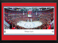 Picture: This 13.5 X 40 panorama of the Washington Capitals playing at the Verizon Center has been professionally double matted in team colors and framed to 18 X 44. It features the Capitals in the National Hockey League Stanley Cup Playoffs in Game 4 of the Eastern Conference Semifinals versus the New York Rangers. It is a marquee matchup and one that fans have become accustomed to seeing in the Playoffs. This was a night to remember, as the Capitals defeated the Rangers behind a game-winning goal 24 seconds into the third period, resulting in a 3-1 series lead