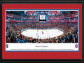 Picture: This 13.5 X 40 panorama of the Montreal Canadiens playing on home ice has been professionally double matted in team colors and framed to 18 X 44. Established in 1909, the Canadiens are the longest continuously operating professional ice hockey team, as well as one of the oldest sports franchises in North America. They are the only existing National Hockey League club to predate the founding of the NHL in 1917, and are one of the Original Six teams that composed the NHL for 25 seasons (1942-1967). As of 2011, the Canadiens were still by far the NHL's most successful club, having won a record 24 Stanley Cup Championships since its inception.