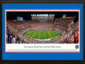 Picture: From 2016 as the Gators dedicate Steve Spurrier-Florida Field on September 3, 2016. This 13.5 X 40 panoramic posters is professionally double matted in team colors and custom framed to 18 X 44 from Florida's 2016 season opening win over UMASS. This panorama captures the evening Steve Spurrier-Florida Field at Ben Hill Griffin Stadium was dedicated. It spotlights the showdown between the Florida Gators and the University of Massachusetts in a season home opener played under the lights at The Swamp. Recognized as one of the toughest environments for a visiting team to compete, The Swamp was constructed in 1930 and ranks as the largest stadium in the state of Florida, with a current seating capacity of 88,548 fans. The Gators first season of football began in 1906 and since that time, they have amassed an impressive number of national championships and SEC titles.