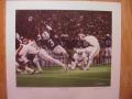 Picture: Daniel Moore hand-signed Alabama Crimson Tide "The Kick" print shows Van Tiffin's 52-yard game-winning field goal at Legion Field on November 30, 1985 that gave Bama the 25-23 win over Auburn.