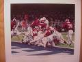 Picture: Daniel Moore hand-signed Alabama Crimson Tide "The Goal Line Stand" print shows Barry Krauss' fourth-and-goal stop of Penn State on January 1, 1979 in Alabama's 14-7 National Championship winning game over Penn State in the Sugar Bowl. Murray Legg, Rich Wingo and Marty Lyons are also on this print.