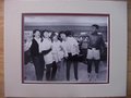 Picture: Muhammad Ali boxing and The Beatles 8 X 10 photo professionally double matted to 11 X 14 so that it fits a standard frame.