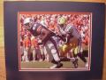 Picture: Courtney Taylor makes a great catch against LSU for the Auburn Tigers original 8 X 10 photo professionaly double matted in team colors to 11 X 14 so that it fits a standard frame that you can find easily and purchase inexpensively.
