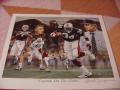 Picture: Auburn Tigers "Legends on the Plains" print with Bo Jackson, Pat Dye, Pat Sullivan, Shug Jordan, Terry Beasley and the blocked punts. Signed by artist Alan Zuniga.