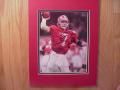 Picture: Jay Barker hand-signed Alabama Crimson Tide "crimson" jersey original 8 X 10 photo professionally double matted to 11 X 14 to fit a standard frame. The autograph is absolutely guaranteed authentic and comes with a Certificate of Authenticity.