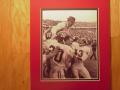 Picture: Bear Bryant is carried off the field after another Alabama Crimson Tide National Champioinship original 8 X 10 photo professionally double matted to 11 X 14 so that it fits a standard frame. 