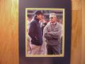 Picture: Lloyd Carr of the Michigan Wolverines with Jim Tressel of Ohio State  8 X 10 photo professionally double matted to 11 X 14 so that it fits a standard frame. 
