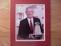 Picture: Darrell Royal Texas Longhorns 8 X 10 photo professionally double matted in team colors to 11 X 14 so that it fits a standard frame.