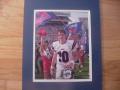 Picture: Eli Manning Ole Miss Rebels 8 X 10 photo double matted to 11 X 14 so that it fits a standard frame.