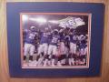Picture: Florida Gators players hold the 2006 SEC Champions sign after beating the Arkansas at the Georgia Dome original 8 X 10 photo professionally double matted to 11 X 14 to fit a standard frame.