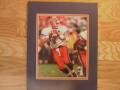 Picture: Danny Weurffel in Florida Gators white original 8 X 10 photo professionally double matted to 11 X 14. Fits a standard frame. 