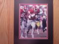 Picture: Herschel Walker Georgia Bulldogs original 8 X 10 photo professionally double matted in Georgia black on red to 11 X 14 so that it fits a standard frame. This is Herschel with another huge gain against Georgia Tech!