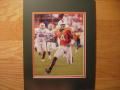 Picture: Devin Hester in Miami Hurricanes orange uniform original 8 X 10 photo professionally double matted in team colors to 11 X 14 so that it fits a standard frame that you can find easily and buy inexpensively.