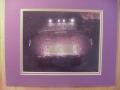 Picture: LSU Tigers Tiger Stadium at night original 8 X 10 photo professionally double matted in team colors to 11 X 14 so that it fits a standard frame. The Band has spelled out "LSU" on the field!