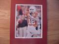 Picture: Colt McCoy Texas Longhorns Tostitos Fiesta Bowl 8 X 10 photo double matted to 11 X 14 so that it fits a standard frame.