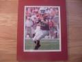 Picture: Colt McCoy Texas Longhorns 8 X 10 photo double matted to 11 X 14 so that it fits a standard frame.