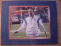 Picture: Urban Meyer Florida Gators 8 X 10 photo professionally double matted in team colors to 11 X 14 so that it fits a standard frame.