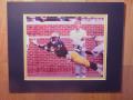 Picture: Desmond Howard Michigan Wolverines original 8 X 10 photo of the "Heisman Catch" professionally double matted to 11 X 14 to fit a standard frame.
