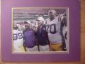 Picture: Les Miles with his LSU Tigers coaches and players after another Tiger Bowl win original 8 X 10 photo professionally double matted to 11 X 14 so that it fits a standard frame.