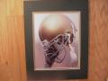 Picture: Notre Dame Fighting Irish original 8 X 10 helmet photo professionally double matted to 11 X 14 so that it fits a standard frame.  