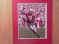Picture: Ted Ginn, Jr. Ohio State Buckeyes original 8 X 10 photo professionally double matted to 11 X 14 to fit a standard frame.