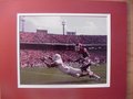 Picture: Quan Cosby makes an incredible catch for the Texas Longhorns against Oklahoma in the Red River Shootout 8 X 10 photo professionally double matted in team colors to 11 X 14 so that it fits a standard frame.