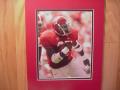 Picture: Shaun Alexander carrying the ball Alabama Crimson Tide original 8 X 10 photo professionally double matted to 11 X 14 to fit a standard frame! 