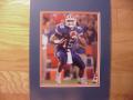 Picture: Tim Tebow Florida Gators 8 X 10 photo professionally double matted in team colors to 11 X 14 so that it fits a standard frame.