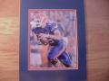 Picture: Tim Tebow Florida Gators 8 X 10 photo professionally double matted in team colors to 11 X 14 so that it fits a standard frame.