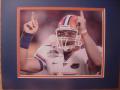 Picture: Tim Tebow Florida Gators close-up at the 2009 BCS National Championship Game 8 X 10 photo professionally double matted in team colors to 11 X 14 so that it fits a standard frame.