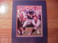 Picture: Tim Tebow Florida Gators 8 X 10 photo professionally double matted in team colors to 11 X 14 so that it fits a standard frame.