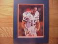 Picture: Tim Tebow Florida Gators 2009 BCS National Championship Game 8 X 10 photo professionally double matted in team colors to 11 X 14 so that it fits a standard frame.