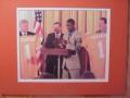 Picture: Tee Martin Tennessee Volunteers "National Champs Visit the White House" original 8 X 10 photo shows President Clinton and Vice President Al Gore holding up a #1 jersey with Tee Martin center professionally double matted to 11 X 14 to fit a standard frame.