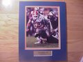 Picture: Tim Tebow Florida Gators 8 X 10 photo professionally double matted in team colors to 11 X 14 with a gold-colored plate that reads "Tim Tebow, #15, Florida Gators."