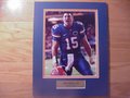 Picture: Tim Tebow Florida Gators 8 X 10 photo professionally double matted in team colors to 11 X 14 with a gold-colored plate that reads "Tim Tebow, #15, Florida Gators."
